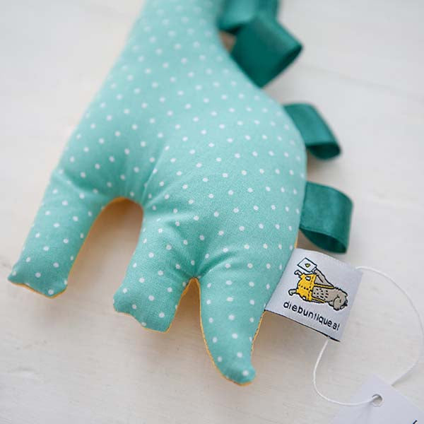 Dinosaurier Rassel mint & gelb