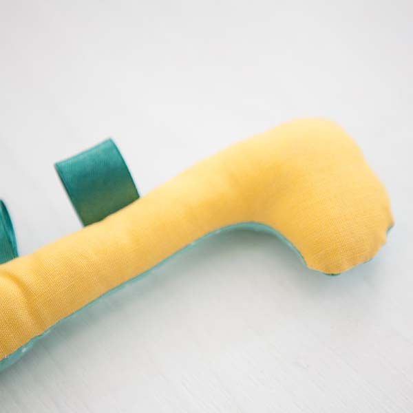 Dinosaurier Rassel mint & gelb